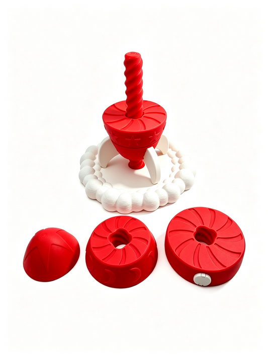 Rocket partly dismantled: red spiral spindle on the cloud base with three stacking rings beside it